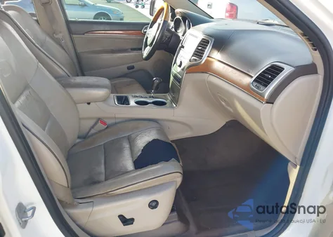 2012 Jeep Grand Cherokee Overland z USA, uszkodzony, nr VIN 1C4RJECT7CC291204